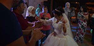Aydın'ın İncirliova ilçesinde oturan 30 yaşındaki zihinsel engelli Gamze Çelikkurt'un gelinlik giyme hayali, düzenlenen temsili düğünle gerçekleşti. ( Gökhan Düzyol - Anadolu Ajansı )
