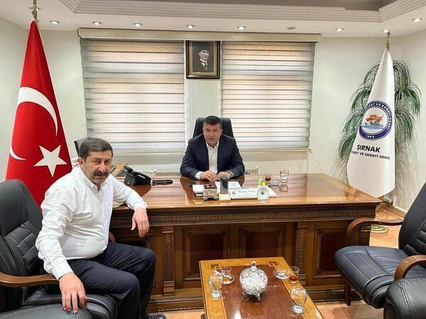 Şırnak Ticaret ve Sanayi Odası Başkanı Osman Geliş (masada oturan) ve kardeşi Sami Geliş