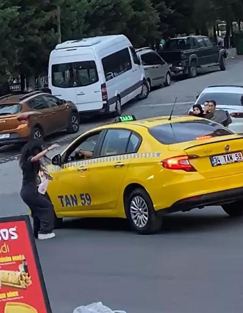 Tartıştığı kızı yumruk atarak bayıltan taksici kaçtı
