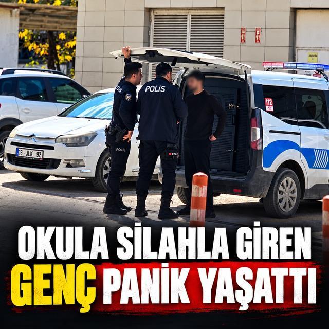 Okula silahla giren genç panik yaşattı