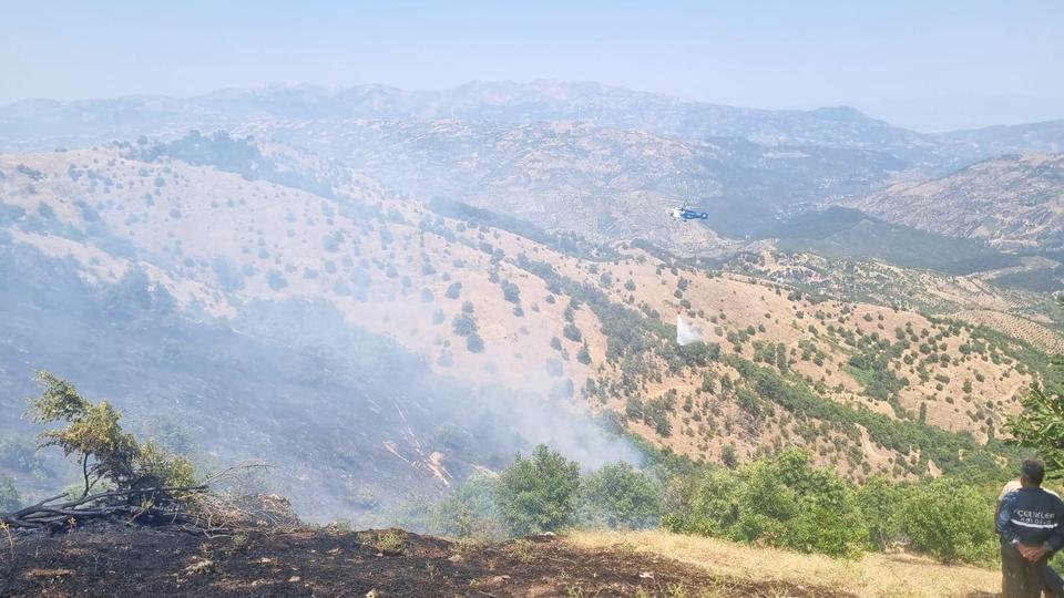 Aydın sınırındaki yangına havadan ve karadan müdahale edildi