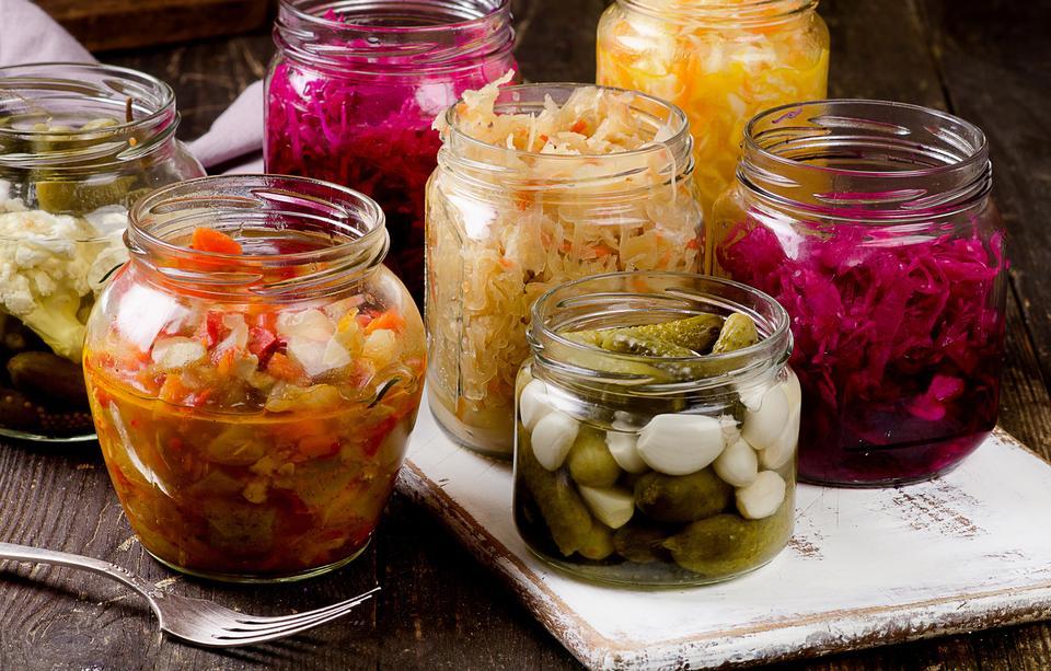 Fermented vegetables in jars. Vegetarian food concept