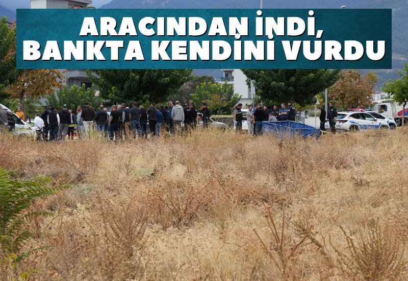 Aracından indi, bankta kendini vurdu