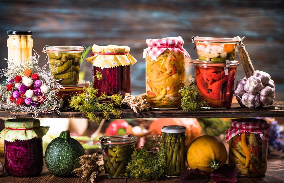 Preserved food, marinated fermented and pickled vegetables in jars