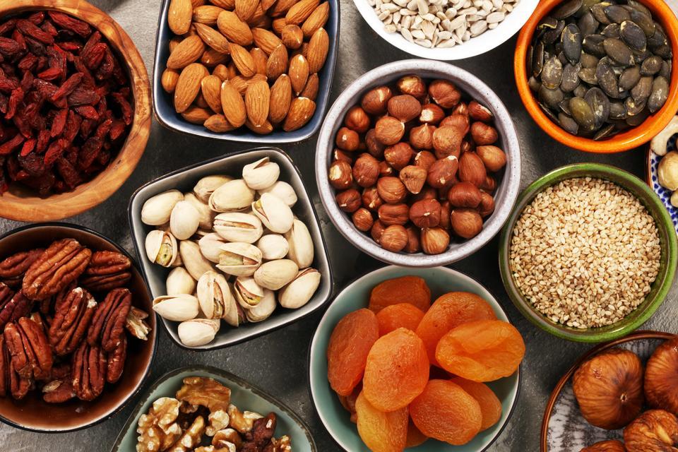 Composition with dried fruits and assorted healthy nuts.