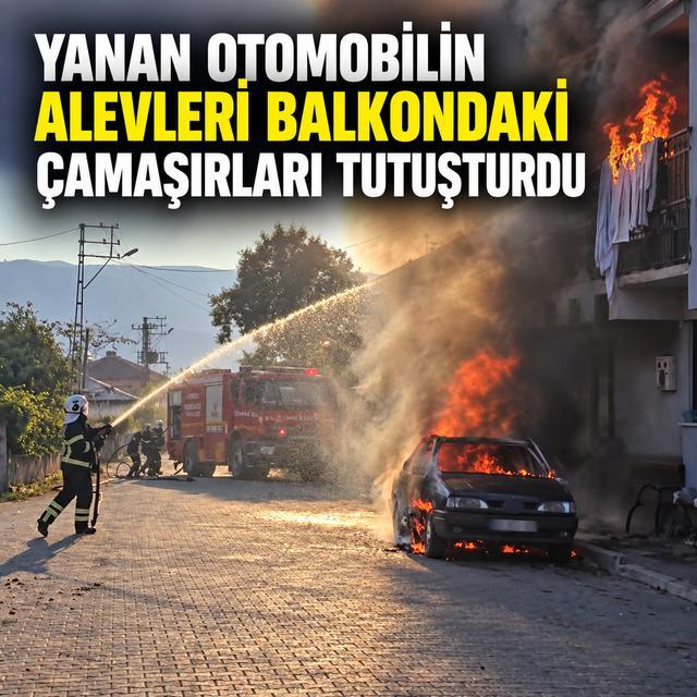 Yanan otomobilin alevleri balkondaki çamaşırları tutuşturdu