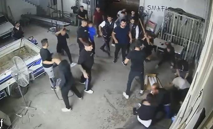 Sopa, kürek ve av tüfekli meydan savaşını andıran kavga