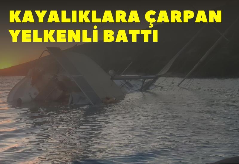 Kayalıklara çarpan yelkenli battı