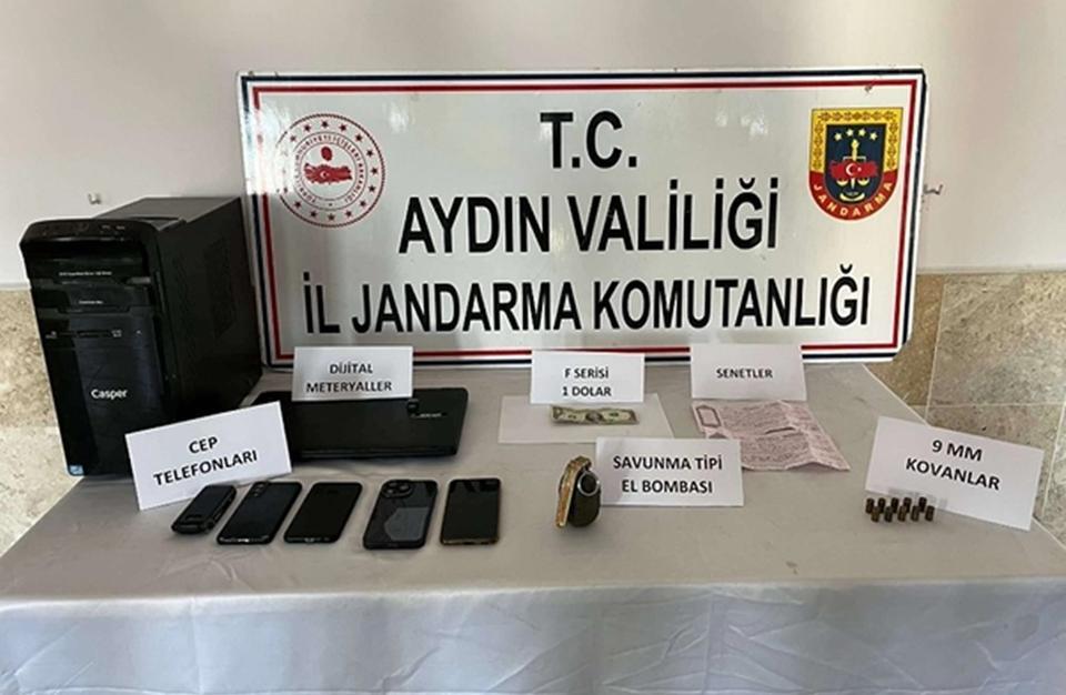AYDIN'DA BİR OTOMOBİLDE YAPILAN ARAMADA EL BOMBASI ELE GEÇİRİLDİ
