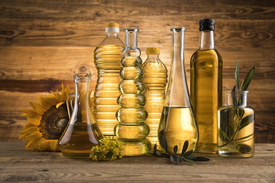 Healthy oil from sunflower, olive, rapeseed oil. Cooking oils in bottle