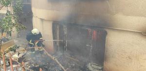 Antalya'da bir binada çıkan yangın itfaiye ekiplerince söndürüldü